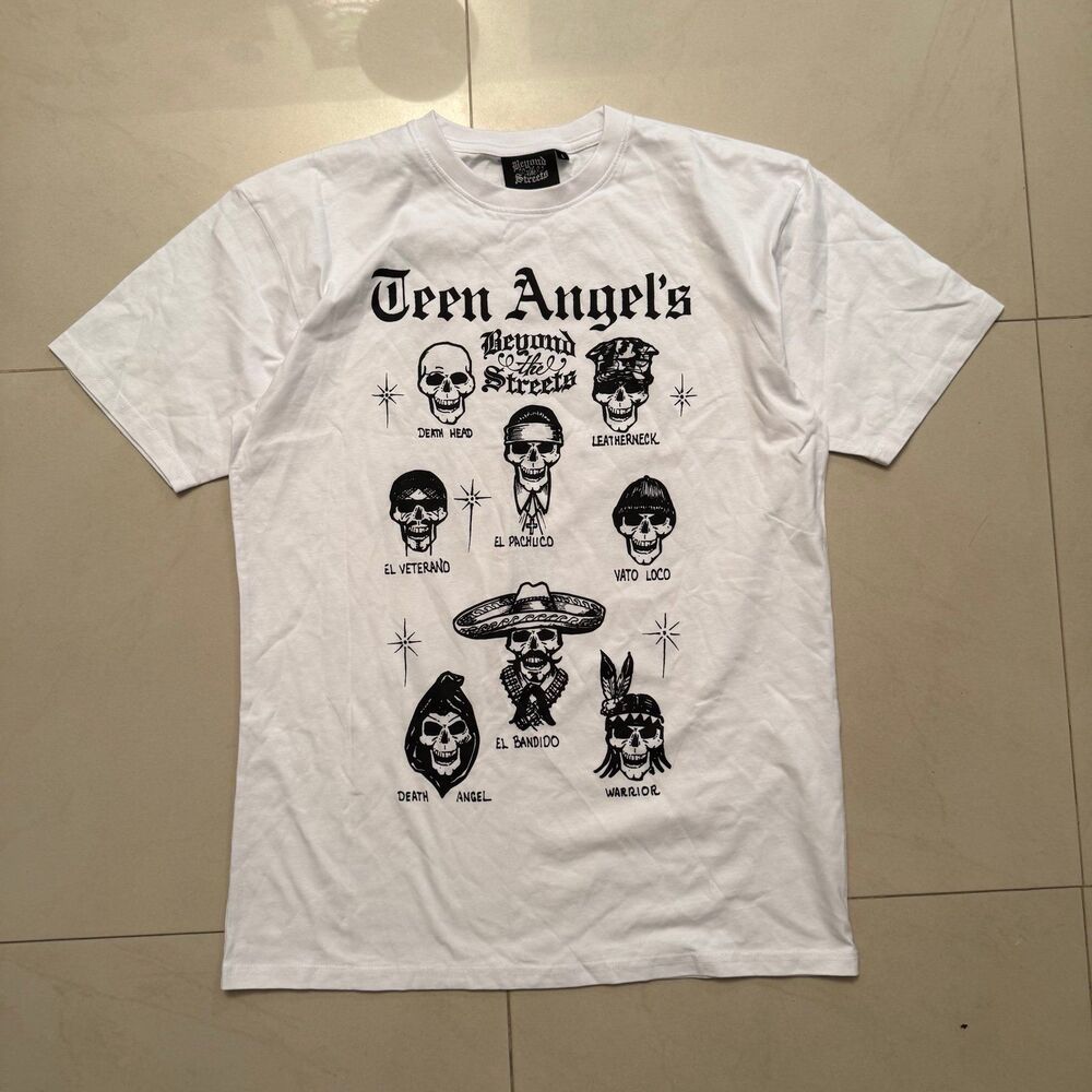 BEYOND THE STREETS Teen Angel's "Calavera" White Tee